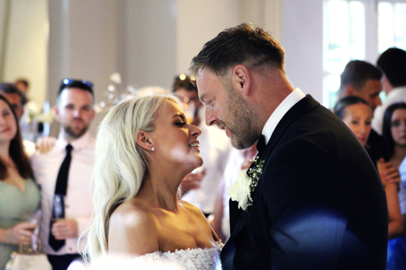 Vibrant editorial wedding shot of the couple together